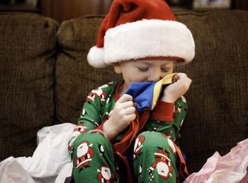 Close-up of boy wearing hat