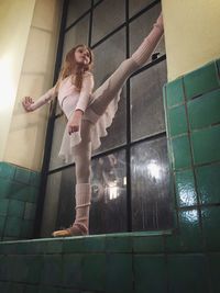 Low angle portrait of young woman