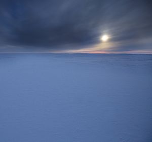 Scenic view of sea against blue sky