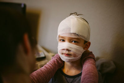 Portrait of boy with bandage