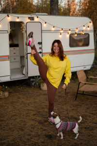 Full length of woman standing on field