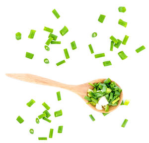 High angle view of chopped vegetables against white background