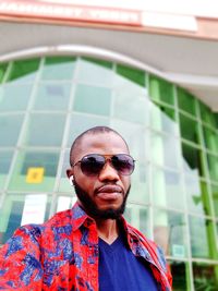 Portrait of young man wearing sunglasses