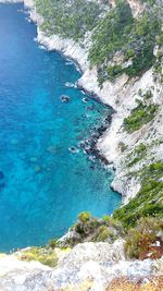 Scenic view of sea against blue sky