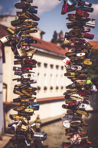 Close-up of padlocks hanging on a bridge