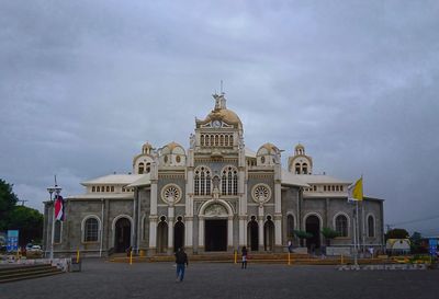 Facade of historic building against sky