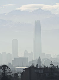 Modern buildings in city against sky