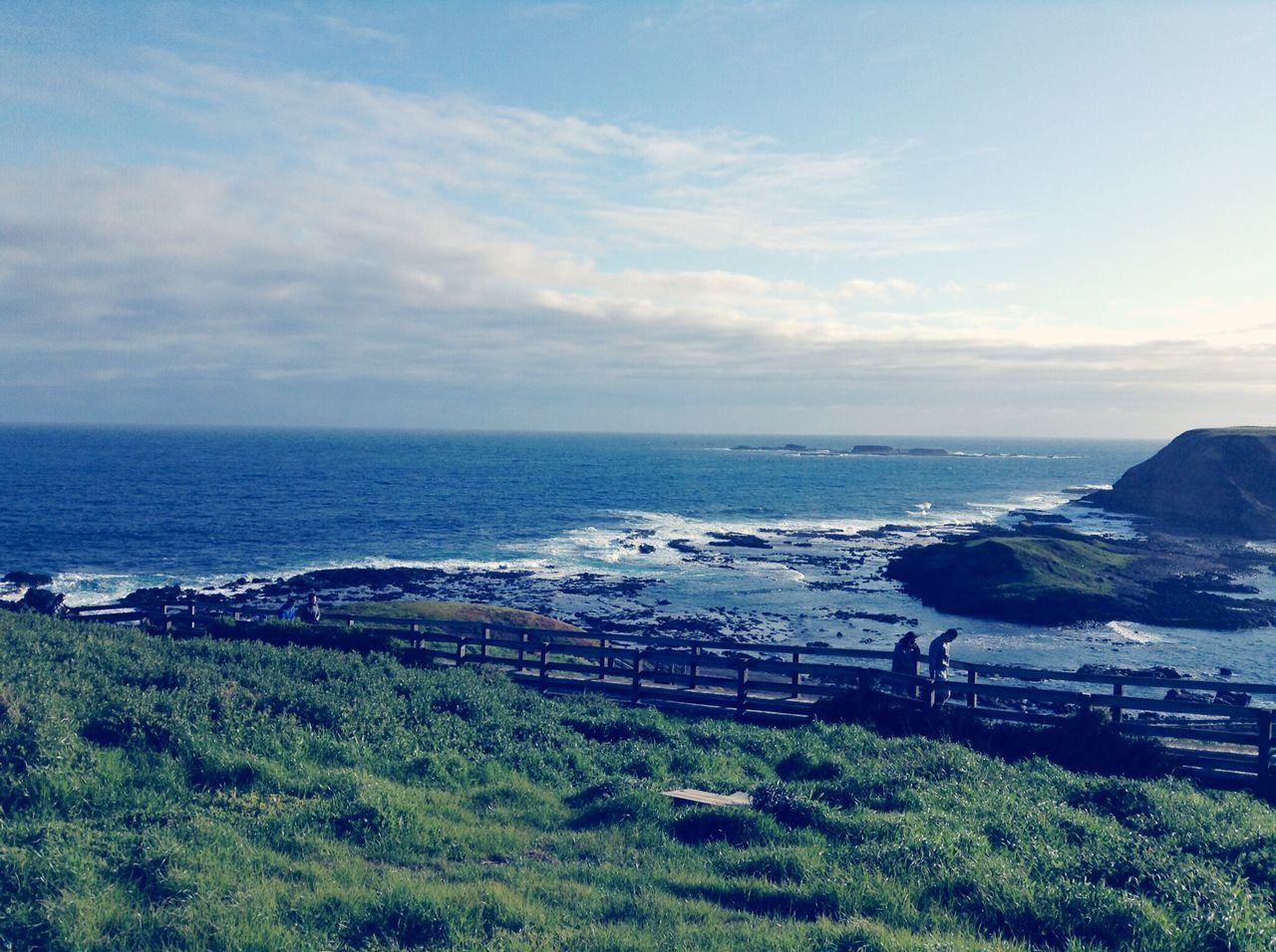 sea, horizon over water, water, sky, scenics, tranquil scene, tranquility, beauty in nature, beach, nature, shore, cloud - sky, coastline, high angle view, grass, idyllic, remote, outdoors, cloud, day