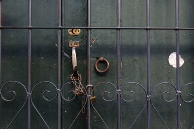 Full frame shot of closed metal gate