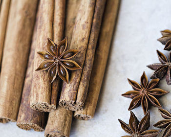 Close-up of cinnamons and star anise on table