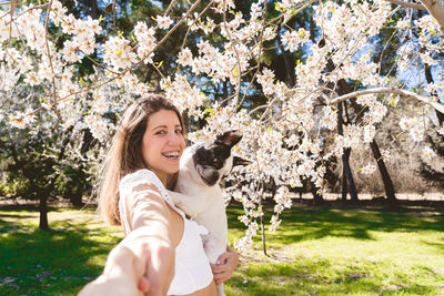 Portrait of woman with dog