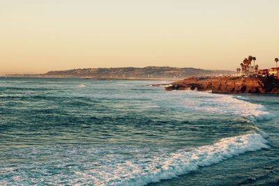 Scenic view of sea at sunset