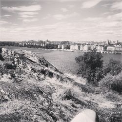 View of landscape against cloudy sky