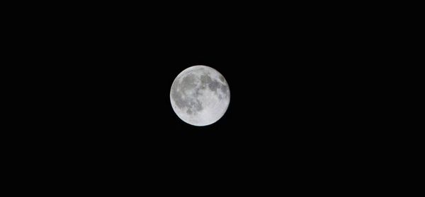 Low angle view of moon in sky