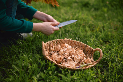 Midsection of woman holding food