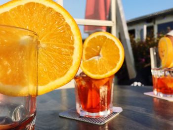 Close-up of orange juice on table