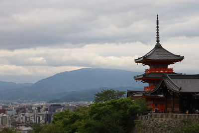 View of pagoda against cloudy sky