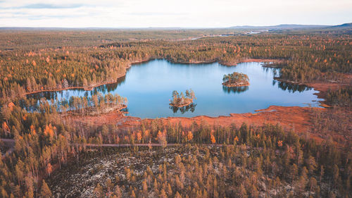 Scenic view of lake against sky during autumn