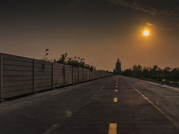 Road against sky during sunset