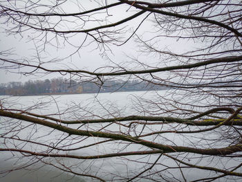 Scenic view of frozen lake against sky during winter