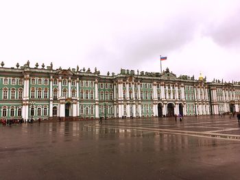 View of buildings against cloudy sky