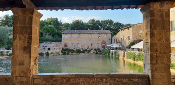 View of old building by lake