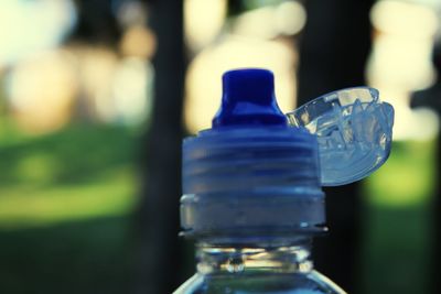 Close-up of glass bottle on table