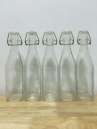 Empty bottles on table