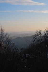 Scenic view of landscape against sky during sunset