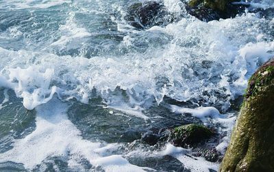 Waves splashing on rocks