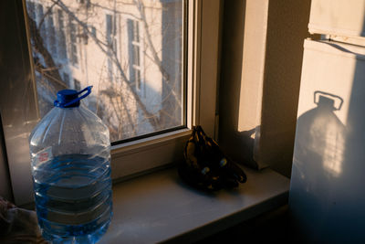 High angle view of plastic bottles on floor