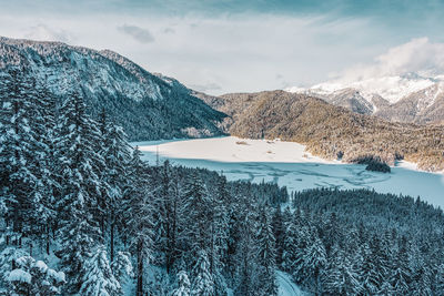 Scenic view of snowcapped mountains against sky