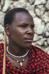 Maasai man portrait in front of the sea