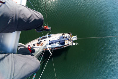 High angle personal perspective of the mast of a sailing boat