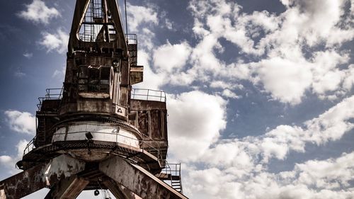 Low angle view of clock tower against sky