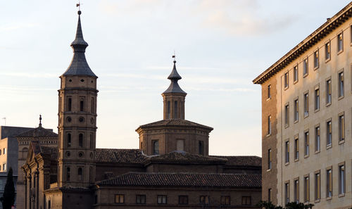 Low angle view of clock tower against sky