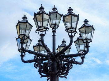 Low angle view of street light against sky