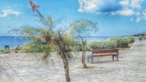 Scenic view of sea against cloudy sky