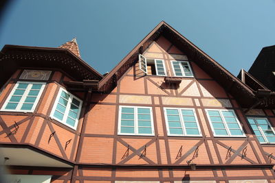 Low angle view of house against sky