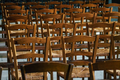 Empty chairs and tables in cafe