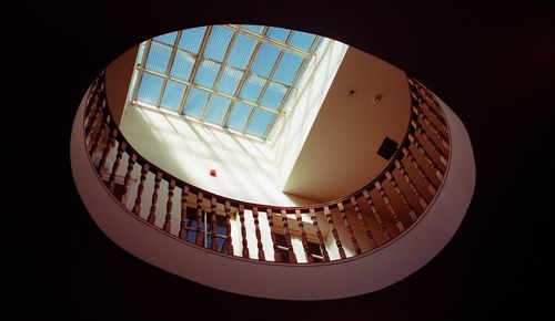 Low angle view of spiral staircase in building