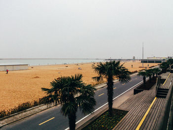 Scenic view of beach against clear sky