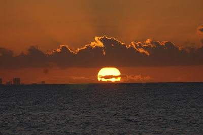 View of calm sea at sunset