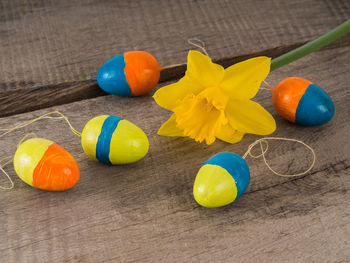 High angle view of multi colored eggs on table