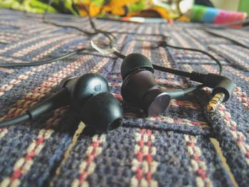 High angle view of electric lamp on metal