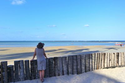 Rear view of man on beach