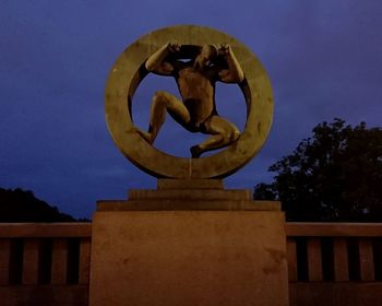 Low angle view of sculpture against clear sky