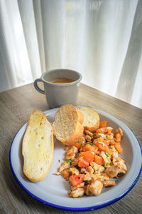 High angle view of breakfast served on table