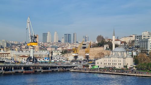 View of buildings in city against sky