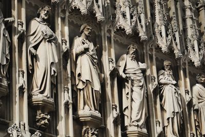 Low angle view of sculptures at church